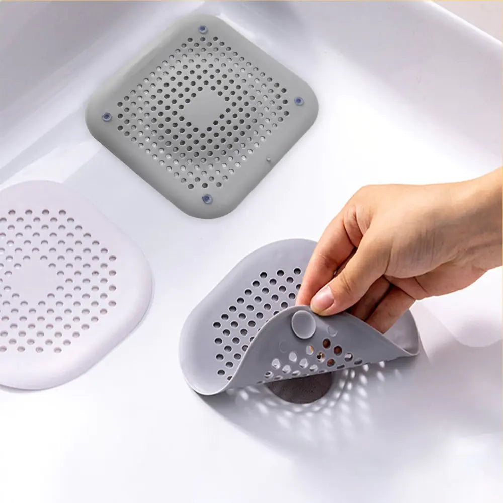 Shower drain strainer